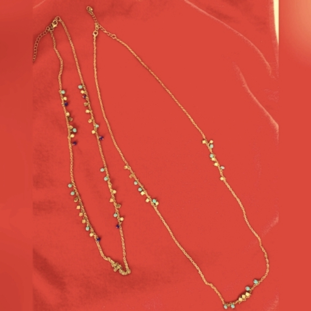 Two Long Chain Necklaces With Beads.